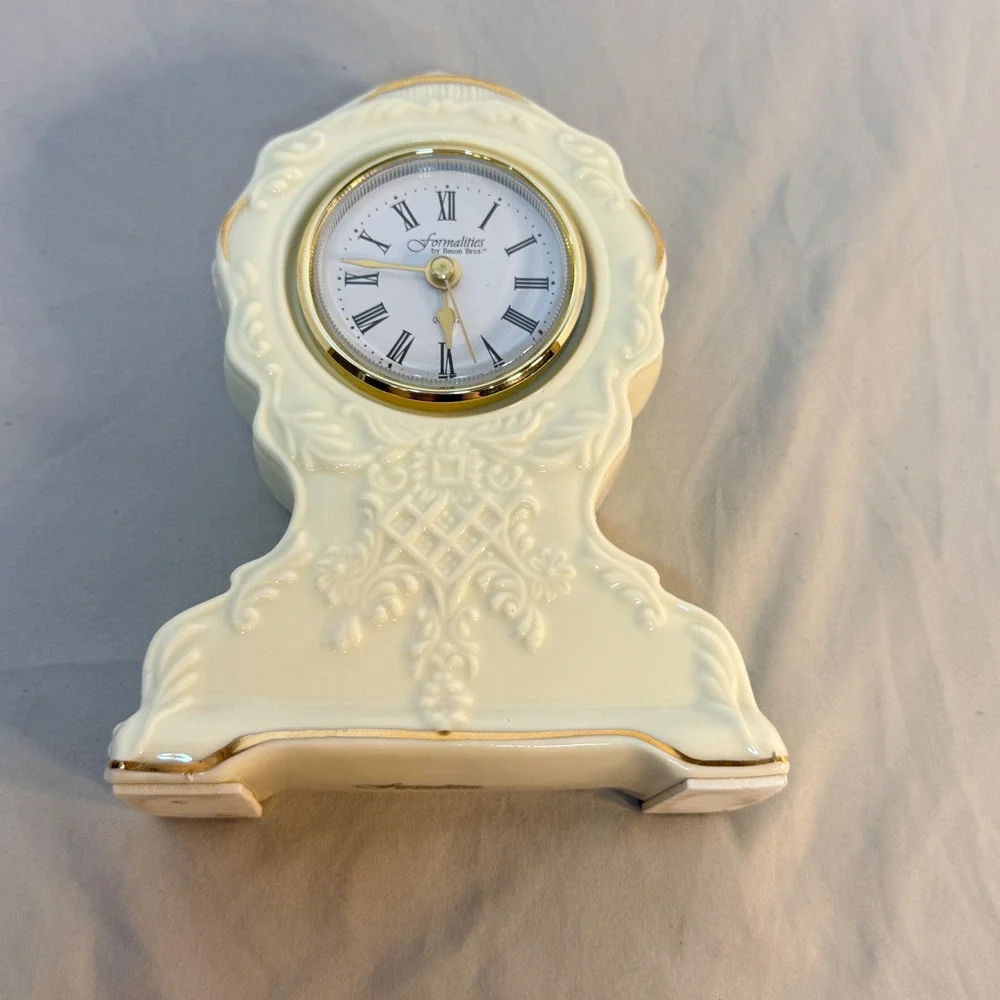 Formalities by Baum Bros Porcelain Mantel Clock Cream Gold Trim Roman Numerals